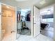 Walk-in closet with ample shelving and mirrored doors at 6450 Shoreline Dr # 9203, St Petersburg, FL 33708