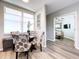 Small dining area with floral chairs at 6450 Shoreline Dr # 9203, St Petersburg, FL 33708