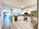 Modern kitchen with stainless steel appliances at 6450 Shoreline Dr # 9203, St Petersburg, FL 33708