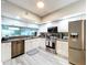 Modern kitchen with stainless steel appliances at 6450 Shoreline Dr # 9203, St Petersburg, FL 33708