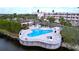 Community pool with a hot tub overlooking a canal at 6450 Shoreline Dr # 9203, St Petersburg, FL 33708
