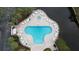 Resort-style pool with plenty of lounge chairs and a hot tub at 6450 Shoreline Dr # 9203, St Petersburg, FL 33708