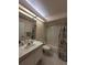 Clean bathroom with bathtub, shower, and vanity at 9305 Haas Dr, Hudson, FL 34669