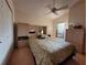 Cozy bedroom with window and built-in storage at 9305 Haas Dr, Hudson, FL 34669