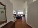Spacious living room with wood floors and access to the backyard at 9305 Haas Dr, Hudson, FL 34669