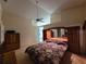 Spacious main bedroom with a large bed and plenty of light at 9305 Haas Dr, Hudson, FL 34669