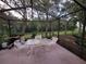 Screened patio provides outdoor seating area at 9305 Haas Dr, Hudson, FL 34669