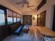 Spacious sunroom with comfortable seating area at 9305 Haas Dr, Hudson, FL 34669