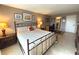 Spacious bedroom with a comfortable bed and built-in desk at 100 Bluff View Dr # 415A, Belleair Bluffs, FL 33770