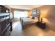 Bright bedroom with a king-size bed and ample closet space at 100 Bluff View Dr # 415A, Belleair Bluffs, FL 33770