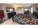 Spacious bedroom with a dresser and large bed at 100 Bluff View Dr # 415A, Belleair Bluffs, FL 33770