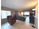 Main bedroom with a relaxing recliner and a desk at 100 Bluff View Dr # 415A, Belleair Bluffs, FL 33770