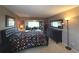 Spacious bedroom with a large bed and built-in bookcases at 100 Bluff View Dr # 415A, Belleair Bluffs, FL 33770