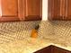 Kitchen detail; granite countertop and tile backsplash at 100 Bluff View Dr # 415A, Belleair Bluffs, FL 33770