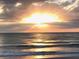 Stunning ocean sunset view with colorful clouds at 100 Bluff View Dr # 415A, Belleair Bluffs, FL 33770