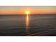 Bright sunset reflecting on the ocean at 100 Bluff View Dr # 415A, Belleair Bluffs, FL 33770