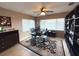 Bright home office with built-in shelving and large windows at 100 Bluff View Dr # 415A, Belleair Bluffs, FL 33770