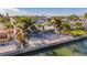 Single-Gathering home on waterfront with palm trees at 16101 6Th E St, Redington Beach, FL 33708