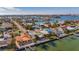 Aerial perspective of a waterfront house in a residential area at 16101 6Th E St, Redington Beach, FL 33708