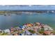 Aerial view of waterfront home with private dock, showcasing the property's location and access to the water at 16101 6Th E St, Redington Beach, FL 33708