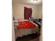 Bedroom with a comfortable bed and soft lighting at 2011 Auburn S St, St Petersburg, FL 33712