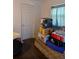 Bedroom containing packed boxes and bins at 2011 Auburn S St, St Petersburg, FL 33712