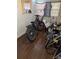 Room containing bicycles and general clutter at 2011 Auburn S St, St Petersburg, FL 33712