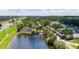 Aerial view of Sun City Center, showcasing community features and lake at 2319 W Del Webb Blvd, Sun City Center, FL 33573