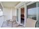 Balcony with sliding doors gives access to bedroom at 273 Madeira Cir, Tierra Verde, FL 33715