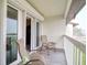 Relaxing balcony with seating offers views at 273 Madeira Cir, Tierra Verde, FL 33715