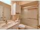 Bathroom with tub-shower, updated vanity, and medicine cabinet at 273 Madeira Cir, Tierra Verde, FL 33715
