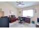 Spacious bedroom features a desk area and a ceiling fan at 273 Madeira Cir, Tierra Verde, FL 33715