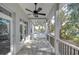 Covered back porch with ceiling fan and patio at 3125 Downing St, Clearwater, FL 33759
