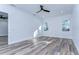 Bright and spacious bedroom featuring wood-look flooring at 3125 Downing St, Clearwater, FL 33759