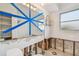 Bathroom with a large mirror and window, currently being renovated at 380 Belle Point Dr, St Pete Beach, FL 33706