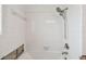 Bathroom with shower and white tile at 380 Belle Point Dr, St Pete Beach, FL 33706