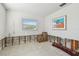 Bedroom with large window, currently undergoing renovations at 380 Belle Point Dr, St Pete Beach, FL 33706