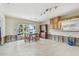 Kitchen with water views and a dining area, currently under renovation at 380 Belle Point Dr, St Pete Beach, FL 33706