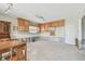 Renovation in progress, featuring wood cabinets and a dining area at 380 Belle Point Dr, St Pete Beach, FL 33706