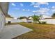 Large backyard with patio, shed, and fenced area at 6213 Venezia Pl, Riverview, FL 33578