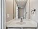 Bathroom with white vanity, sink, and large mirror at 6213 Venezia Pl, Riverview, FL 33578