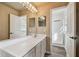 Bathroom with double vanity and shower at 6213 Venezia Pl, Riverview, FL 33578