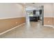 Dining area with view of kitchen and access to backyard at 6213 Venezia Pl, Riverview, FL 33578