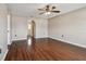 Spacious living room featuring hardwood floors and a ceiling fan at 6213 Venezia Pl, Riverview, FL 33578