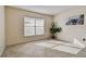Bright living room with tile floors and large window at 6213 Venezia Pl, Riverview, FL 33578