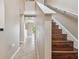 Wood stairs leading to the second floor at 6213 Venezia Pl, Riverview, FL 33578