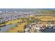 Aerial showing house location near water and golf at 924 Bunker View Dr, Apollo Beach, FL 33572