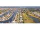 Aerial view of house by canal and golf course at 924 Bunker View Dr, Apollo Beach, FL 33572