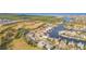 Aerial view of house near canal and golf course at 924 Bunker View Dr, Apollo Beach, FL 33572