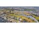 Aerial view showcasing house location by lake and canal at 924 Bunker View Dr, Apollo Beach, FL 33572